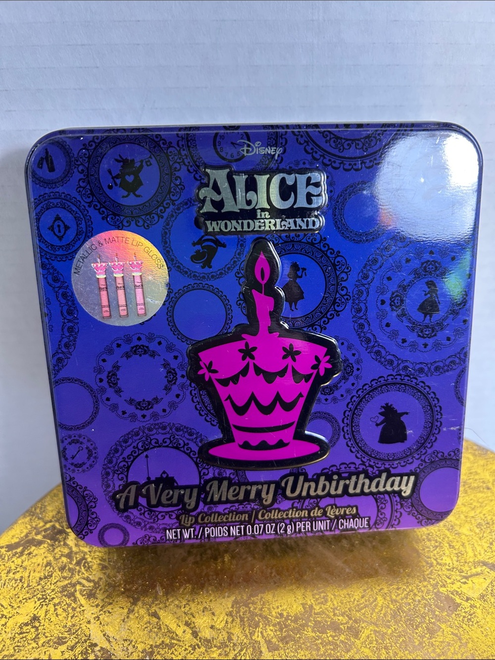 Disney Alice in Wonderland Lip Tin in Purple and Pink